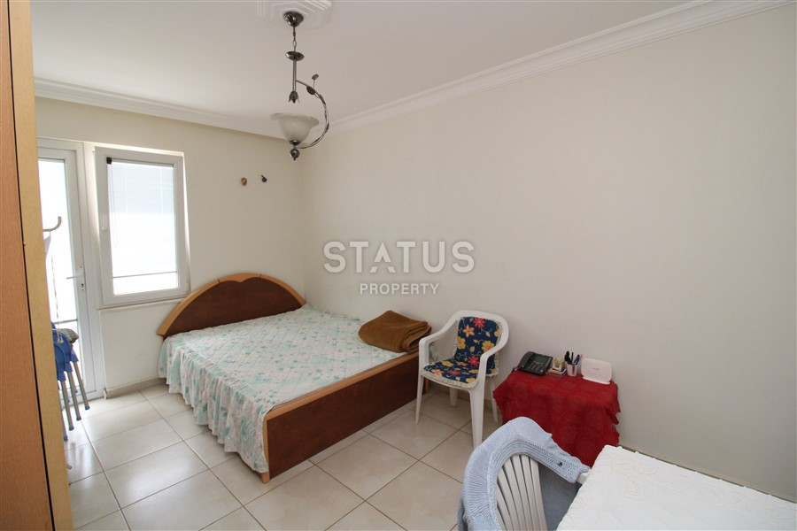 2+1 layout apartment with spacious living room and american style kitchen in Mahmutlar фото 13