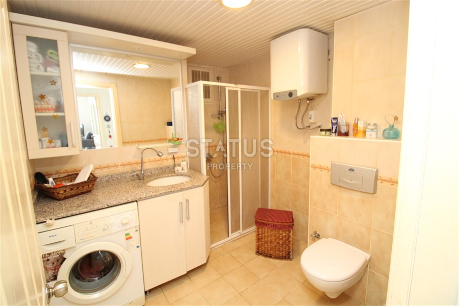 2+1 layout apartment with spacious living room and american style kitchen in Mahmutlar фото 14