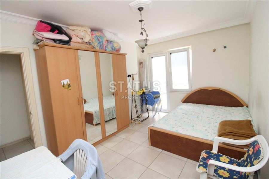 2+1 layout apartment with spacious living room and american style kitchen in Mahmutlar фото 17