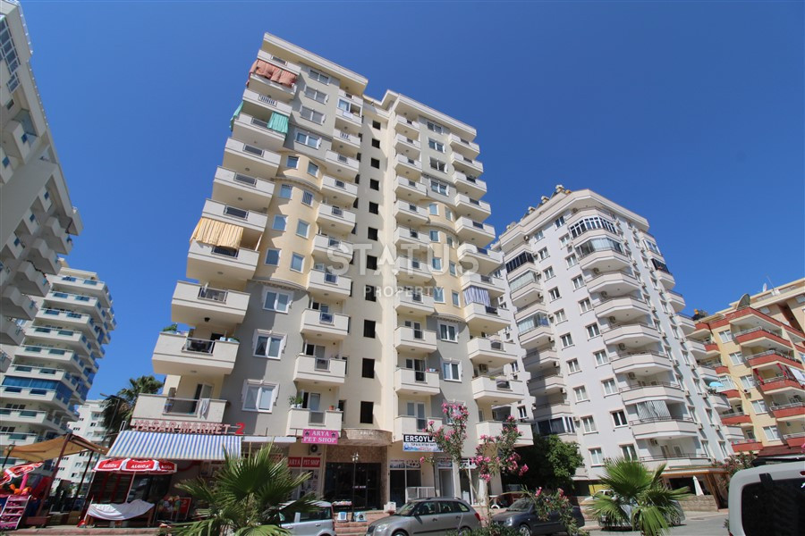 2+1 layout apartment with spacious living room and american style kitchen in Mahmutlar фото 18