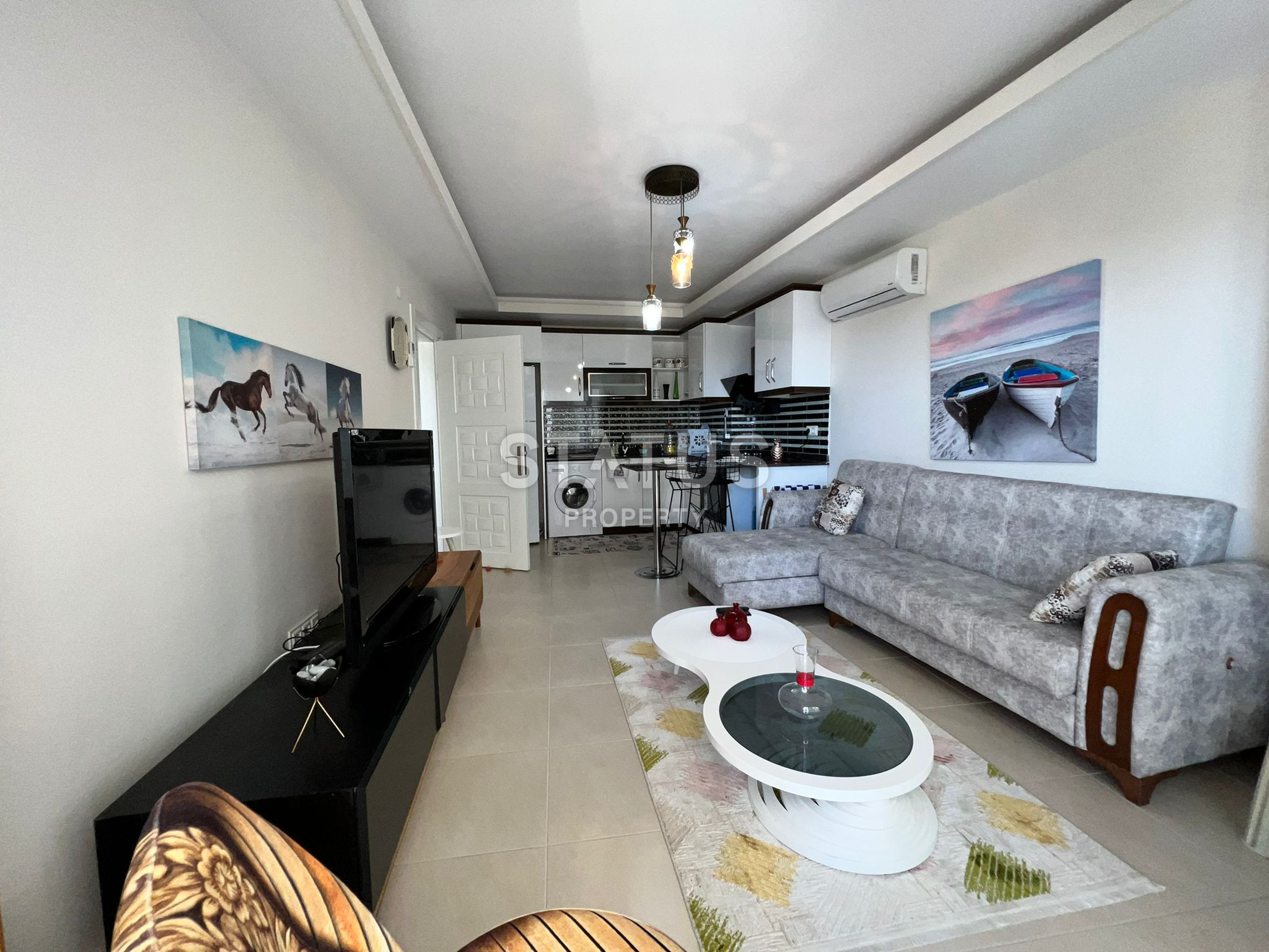 Просторная двухкомнатная квартира  с мебелью в Махмутларе фото 17