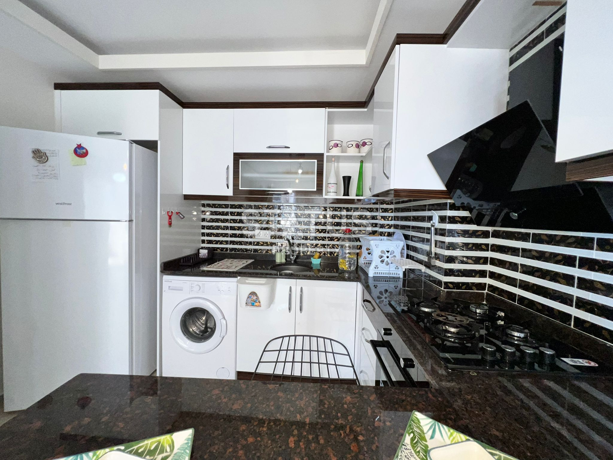 Просторная двухкомнатная квартира  с мебелью в Махмутларе фото 20