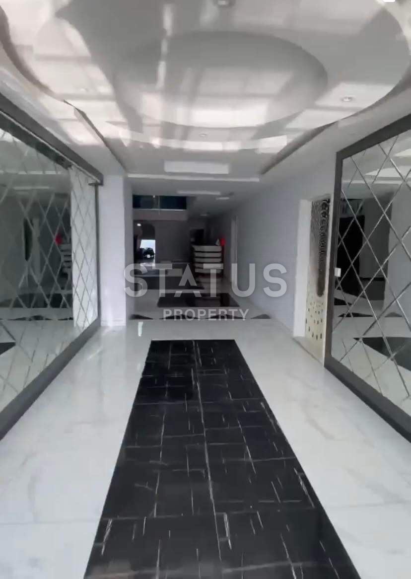 Красивая светлая двухкомнатная квартира в Махмутларе фото 3