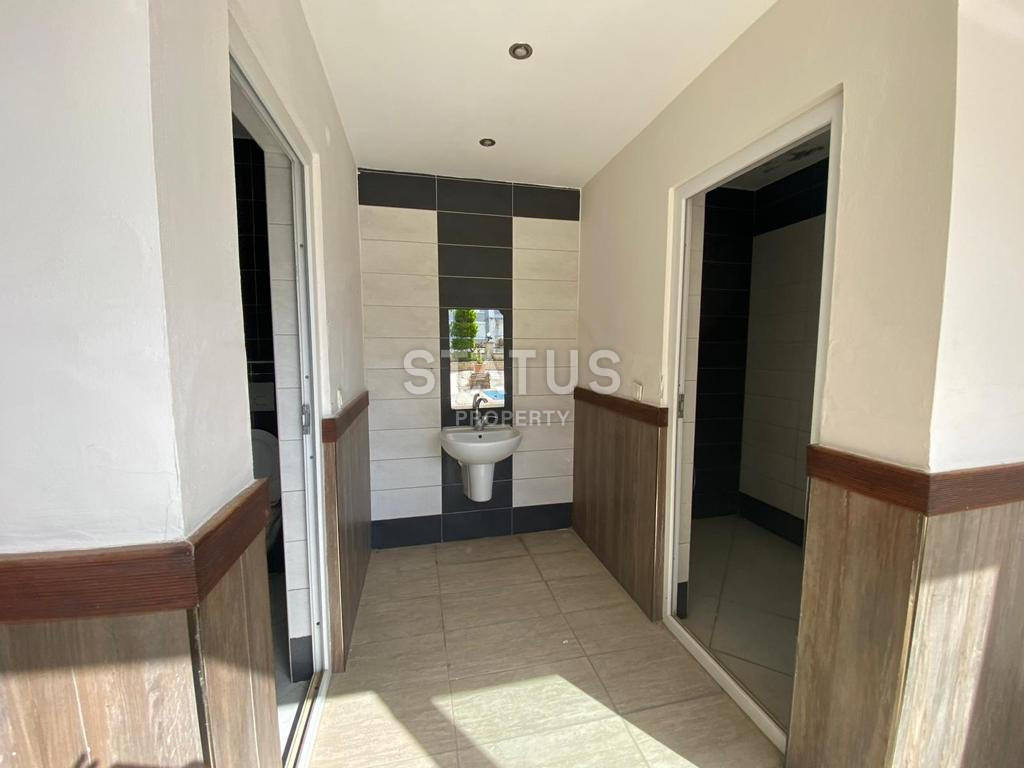 Трёхкомнатная квартира с отдельной кухней и видом на море в центре Алании фото 23