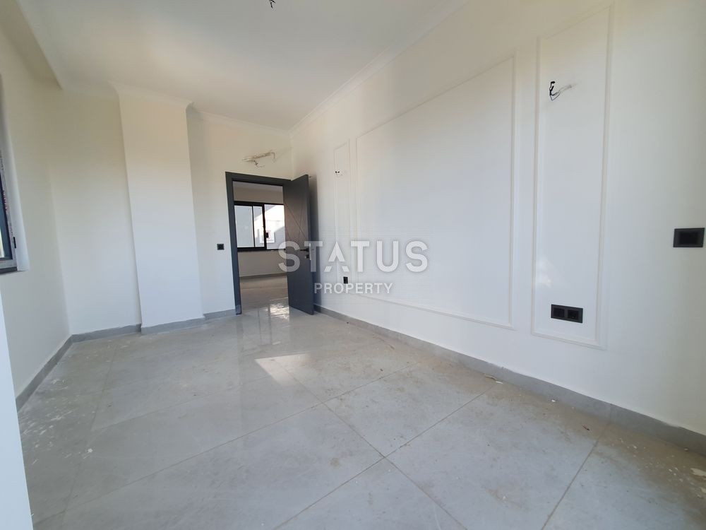 New two-room apartment in a new residential complex in Mahmutlar. 55m2 фото 3