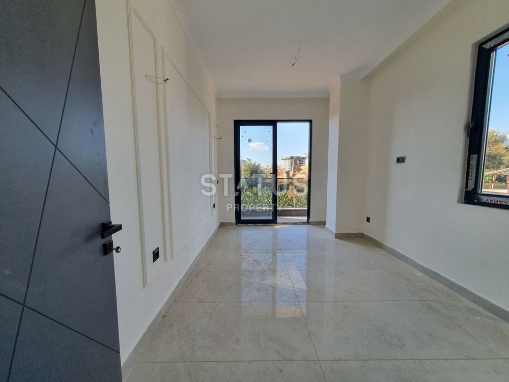 New two-room apartment in a new residential complex in Mahmutlar. 55m2 фото 4
