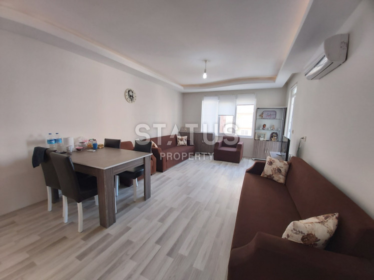 Просторная квартира 1+1 с хорошей локацией по выгодной цене в Махмутларе. фото 1