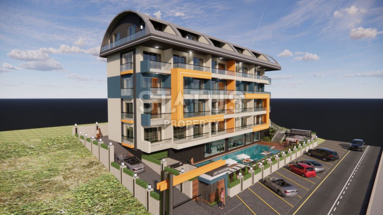 Квартира 1+1 в строящемся проекте по низкой цене в Махмутларе. 51м2 фото 1