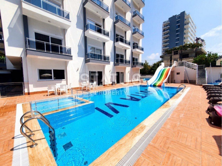 Меблированные апартаменты 1+1 в новом комплексе с инфраструктурой в районе Махмутлар, 60 м2 фото 1