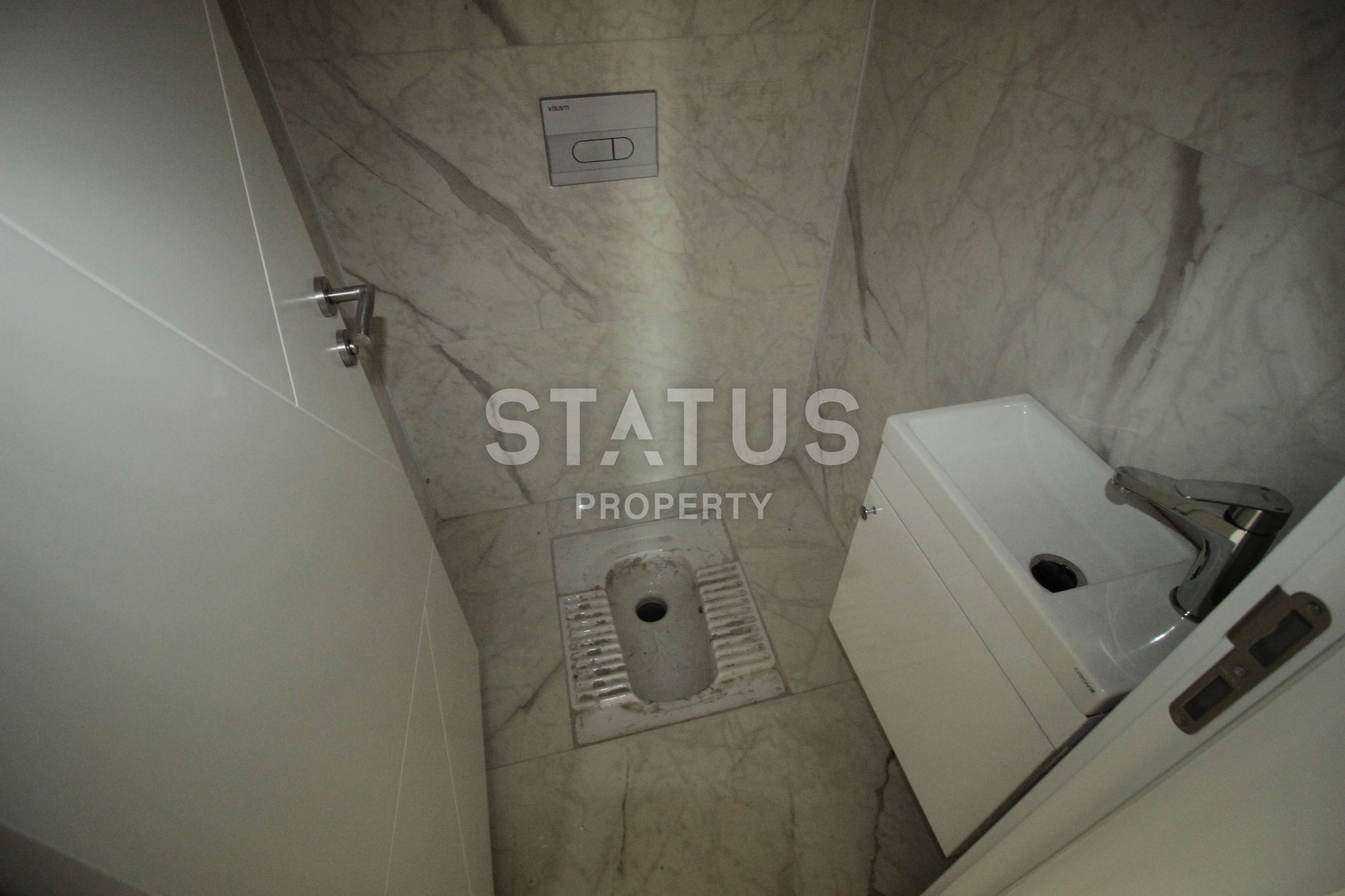 Большая квартира с отдельной кухней в центре Алании в новом доме. 150 кв.м. фото 31