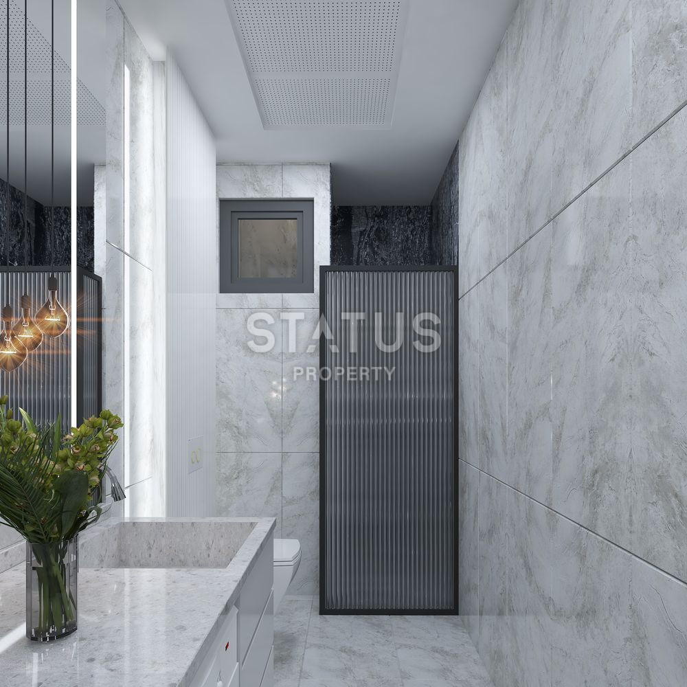 Новый инвестиционный проект в Анталье в районе Алтынташ. 60м2 - 73м2 фото 17