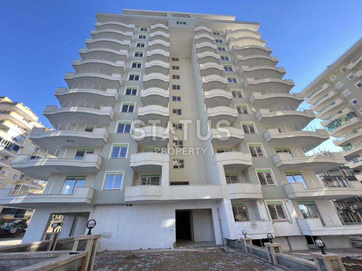 Просторная трёхкомнатная квартира в комплексе на этапе строительства в Махмутларе. 125м2 фото 1