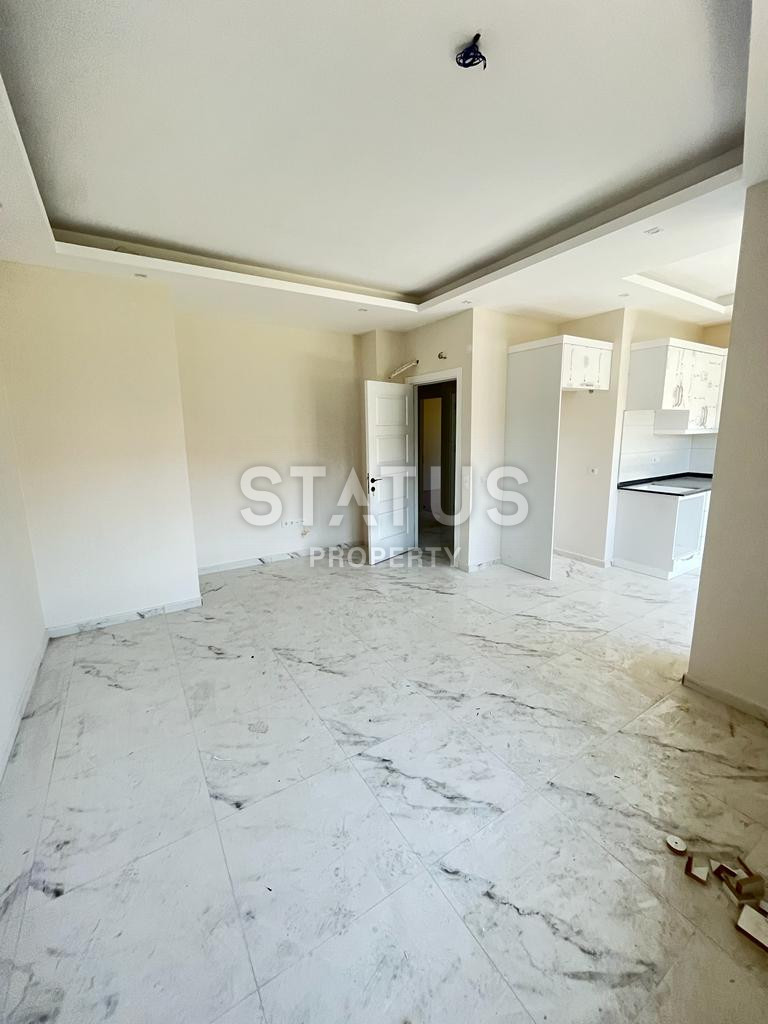 Three-room apartment in the center of Alanya in a new residential complex. 100m2 фото 4
