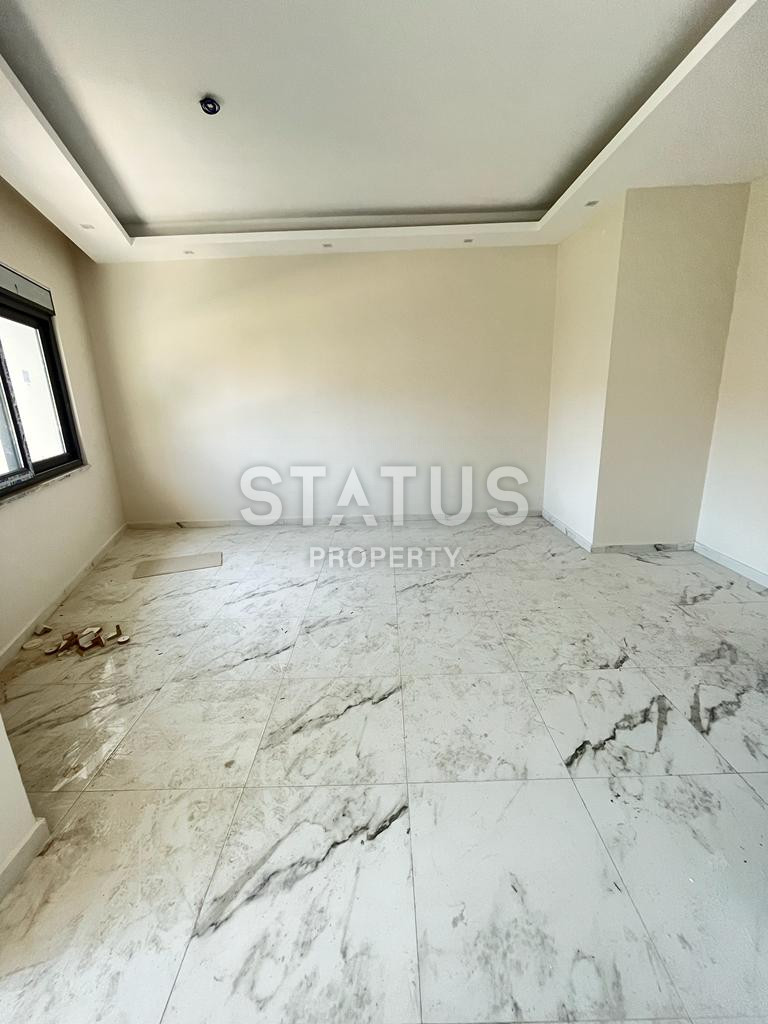 Three-room apartment in the center of Alanya in a new residential complex. 100m2 фото 5