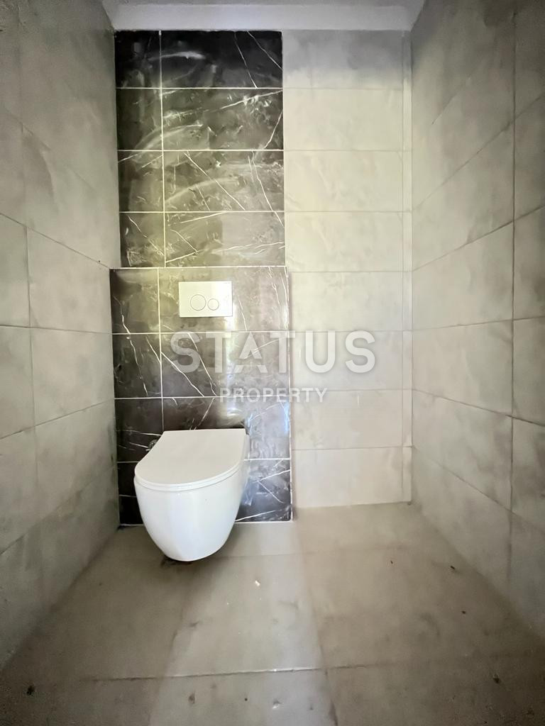 Three-room apartment in the center of Alanya in a new residential complex. 100m2 фото 8