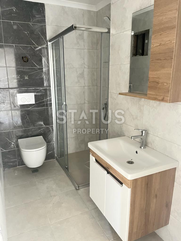 Three-room apartment in the center of Alanya in a new residential complex. 100m2 фото 9