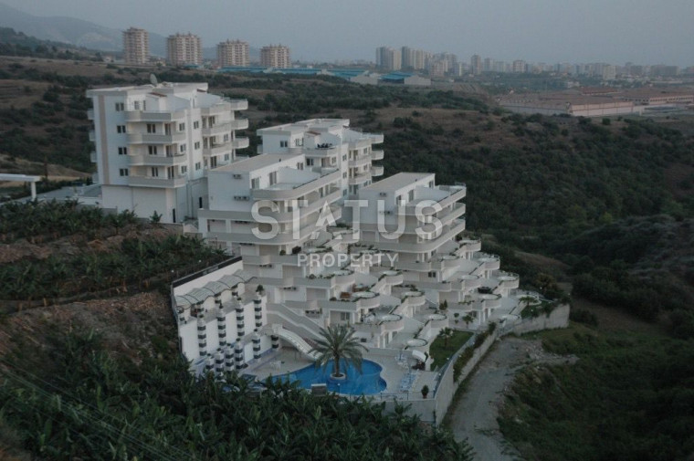 Двухуровневая квартира 2+1 с видом на море и крепость в Махмутларе. 120м2 фото 1