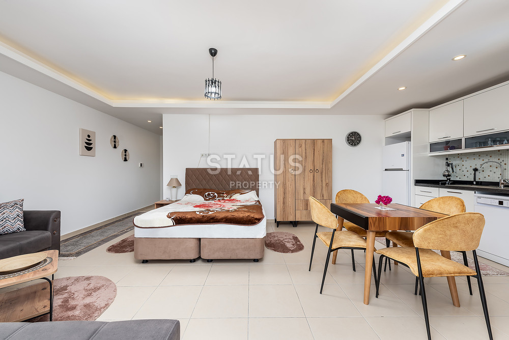 Furnished spacious studio in the residential complex of the hotel board in Avsallar. 58m2 фото 3