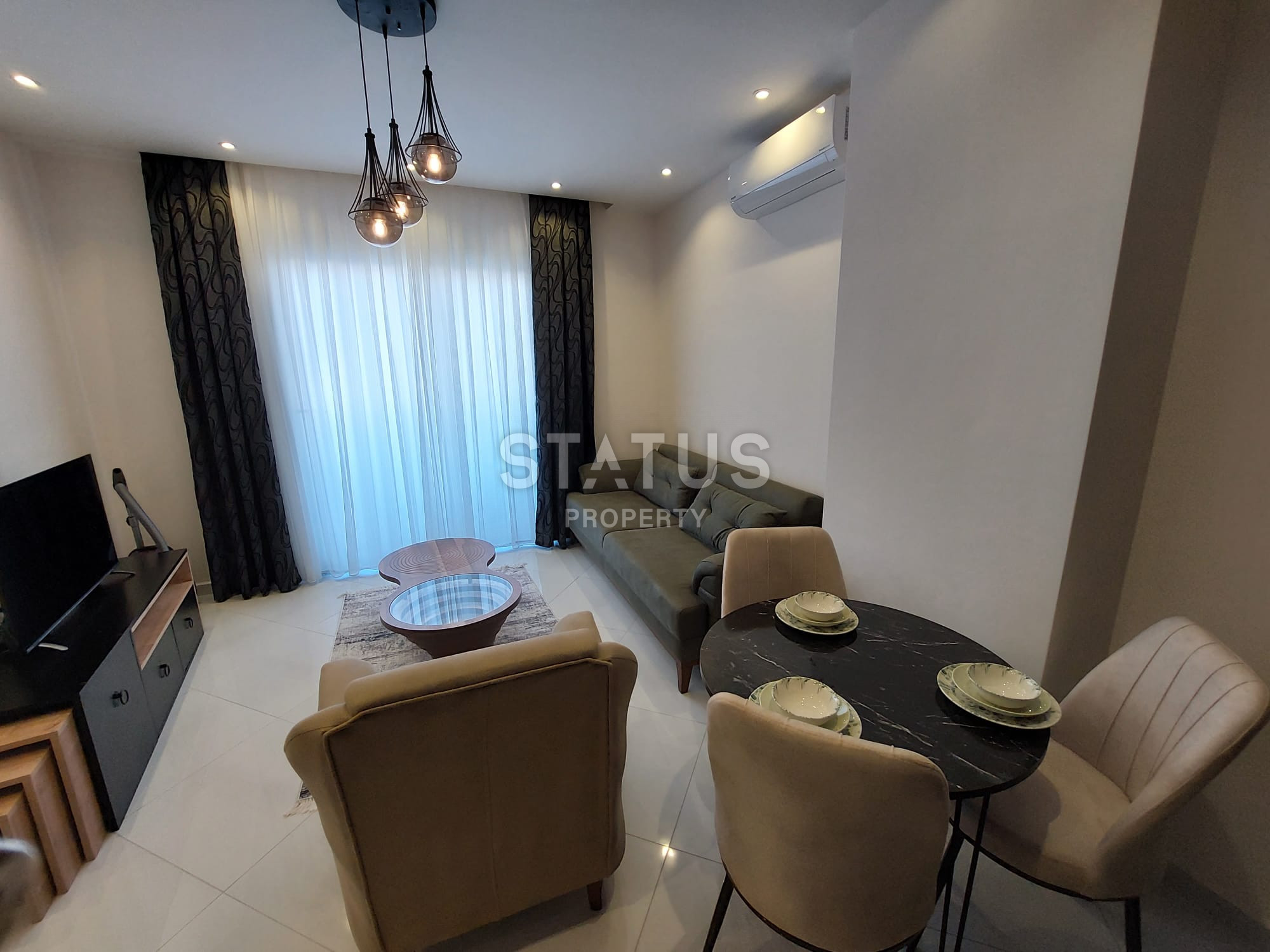 Апартаменты 1+1 в жилом комплексе отельного типа в Махмутларе, 55 м2. фото 3