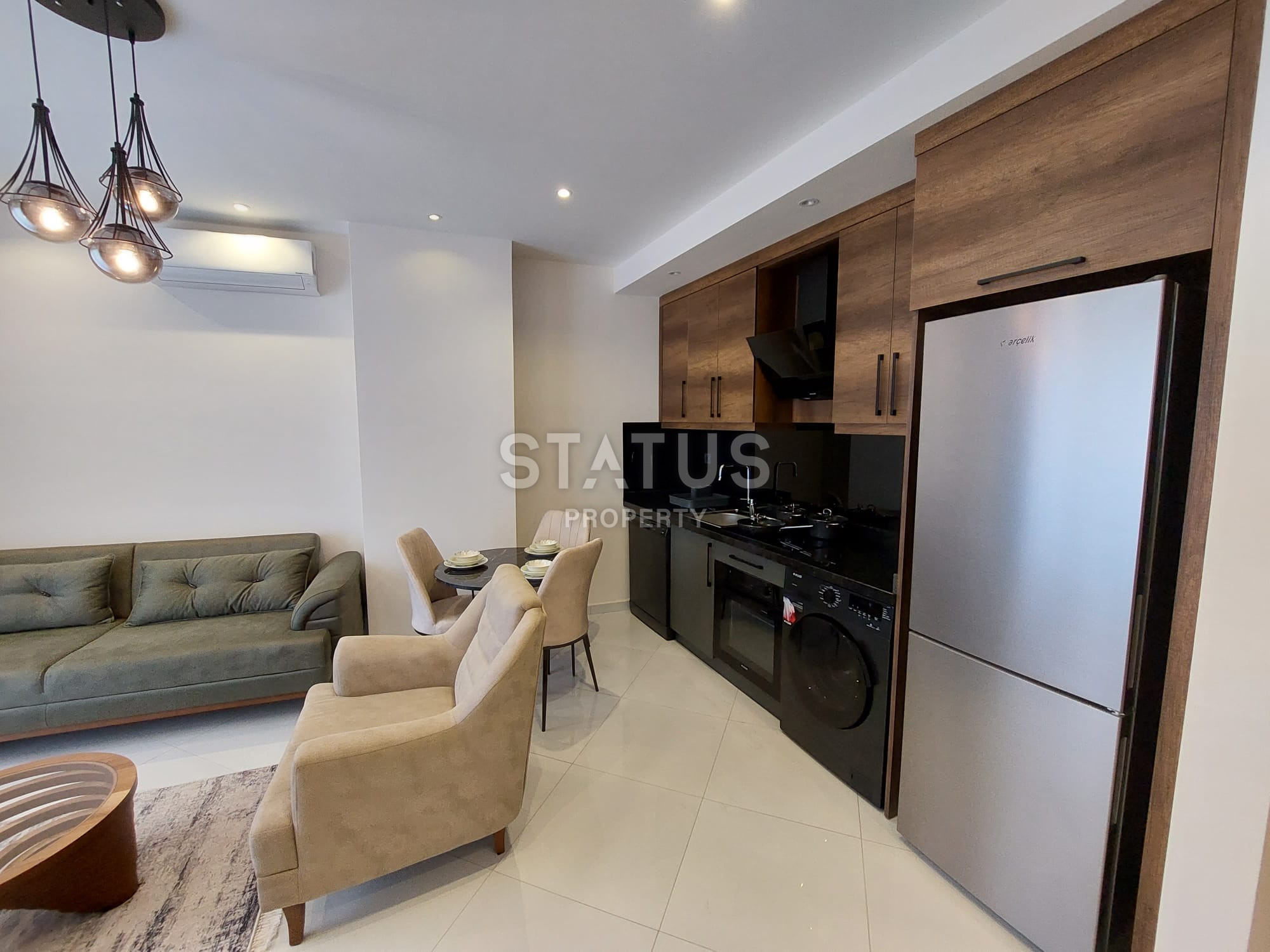 Апартаменты 1+1 в жилом комплексе отельного типа в Махмутларе, 55 м2. фото 13