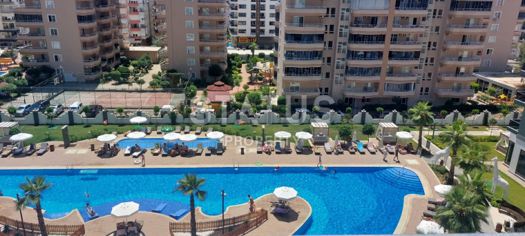 Апартаменты 2+1 в комплексе отельного плана в Махмутларе, 90 м2. фото 1