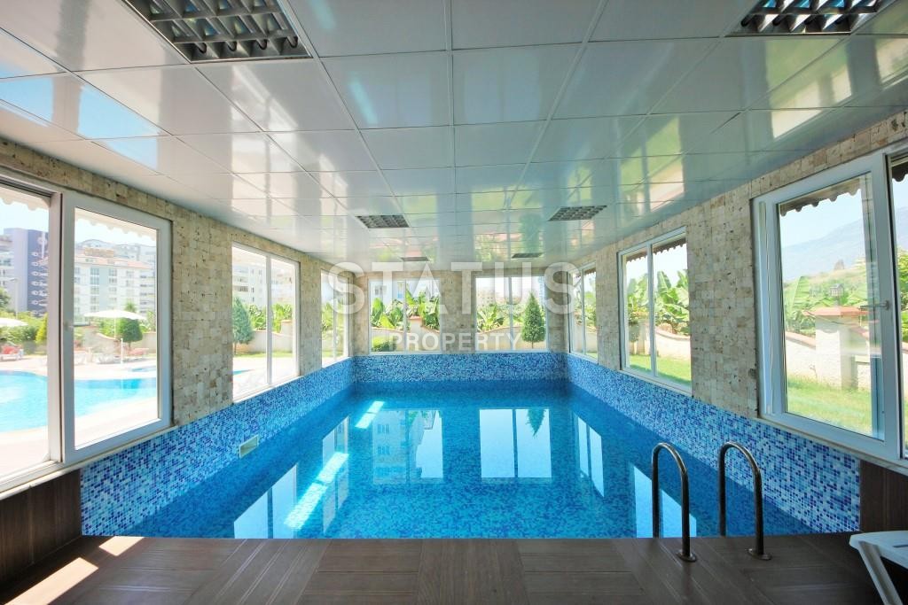 Двухкомнатная меблированная квартира в новом комплексе, 65 м2 фото 12