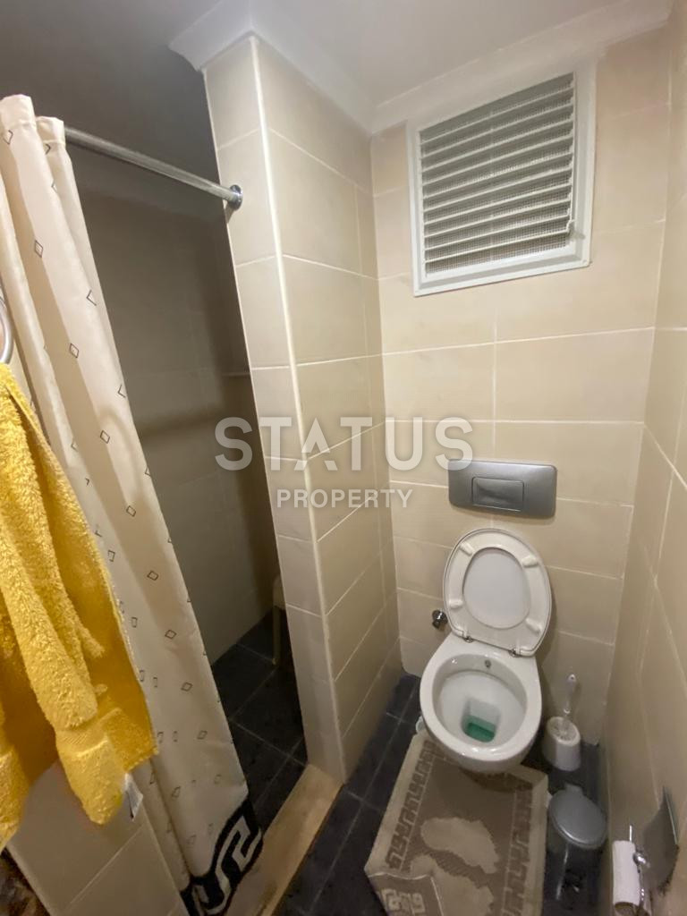 Просторная двухкомнатная квартира с частичным видом на море в Джикджили. 83м2 фото 11