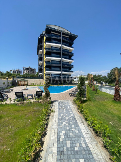 Новые апартаменты 1+1 в новом ЖК в Авсалларе. 66м2 фото 1