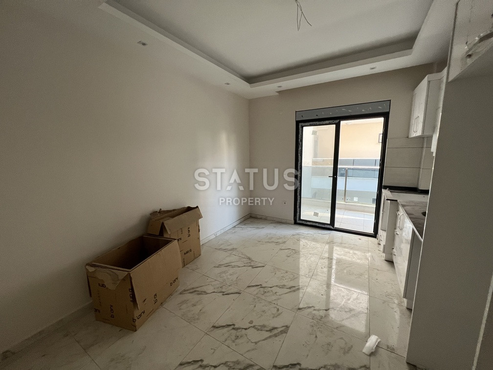 Двухкомнатная квартира в новом ЖК в центре Аланьи. 55м2 фото 5