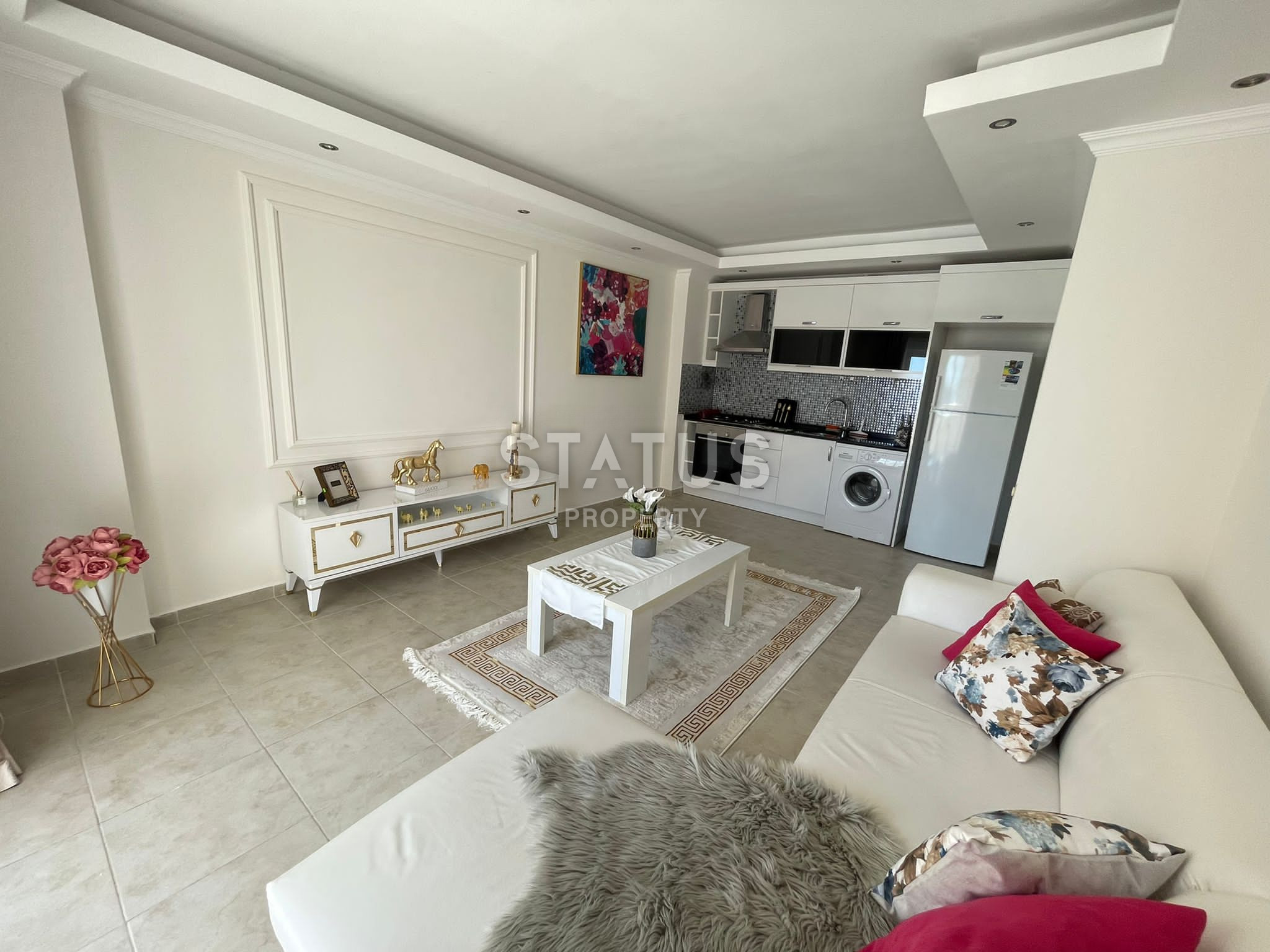 One bedroom apartment with partial sea view in Mahmutlar. 65m2 фото 3