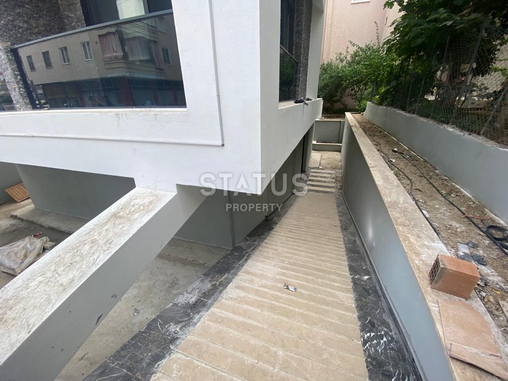 Двухкомнатные квартиры в новом ЖК в центре Аланьи 250м от моря. 48-53м2 фото 2
