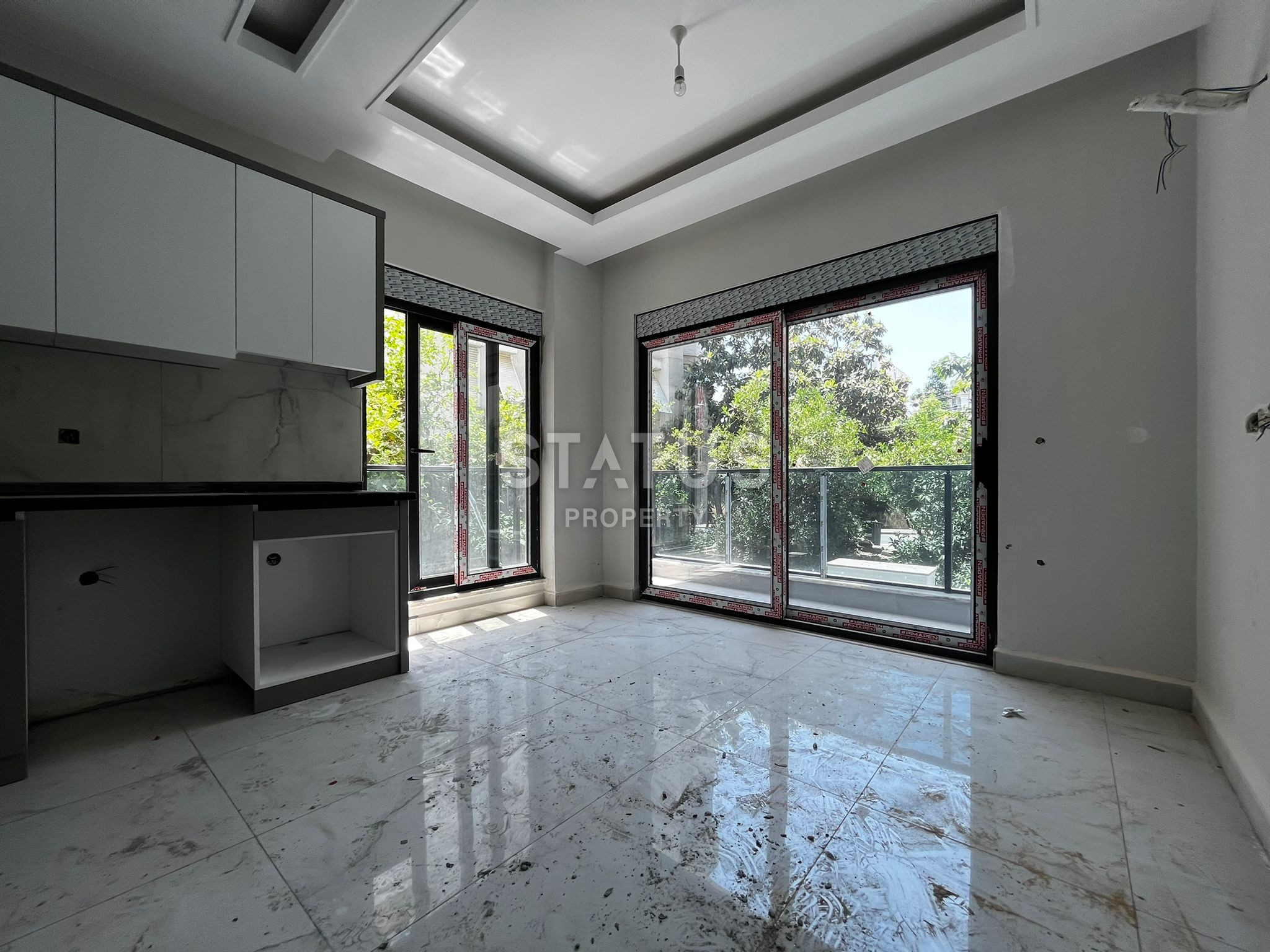 Двухкомнатные квартиры в новом ЖК в центре Аланьи 250м от моря. 48-53м2 фото 3