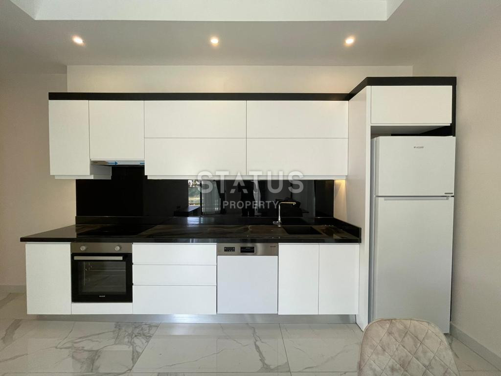 Меблированные апартаменты 2+1 на первой береговой линии в Каргыджаке,90 м2 фото 3