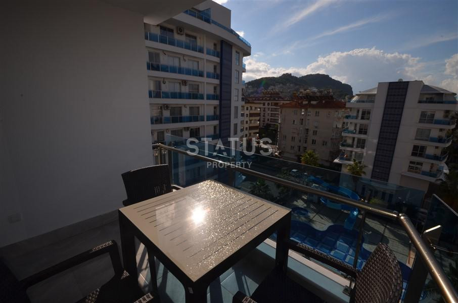 Апартаменты 2+1 в районе пляжа Клеопатры с мебелью в ЖК премиум класса. 90м2 фото 3