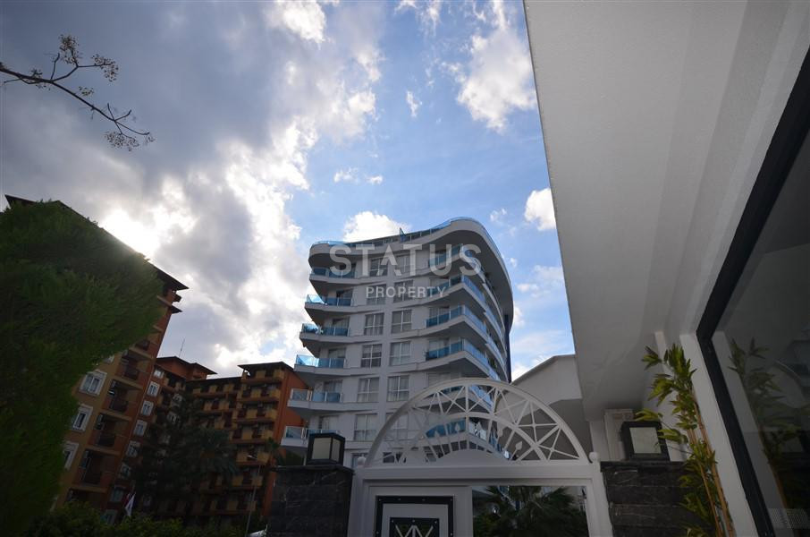 Апартаменты 2+1 в районе пляжа Клеопатры с мебелью в ЖК премиум класса. 90м2 фото 4