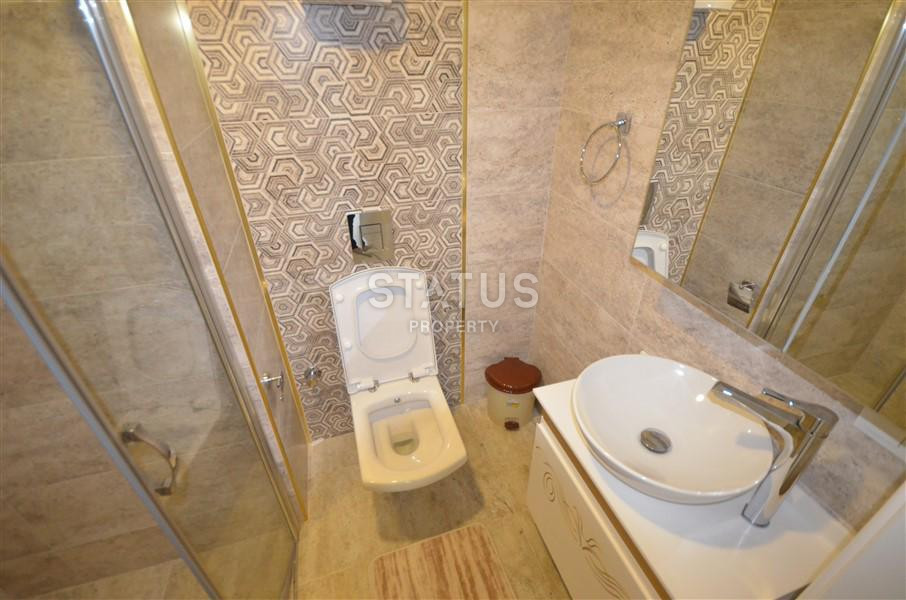 Апартаменты 2+1 в районе пляжа Клеопатры с мебелью в ЖК премиум класса. 90м2 фото 9