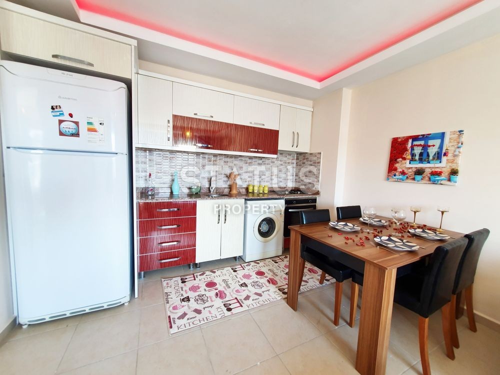 Меблированная двухкомнатная квартира в Махмутларе, 72 м2 фото 8