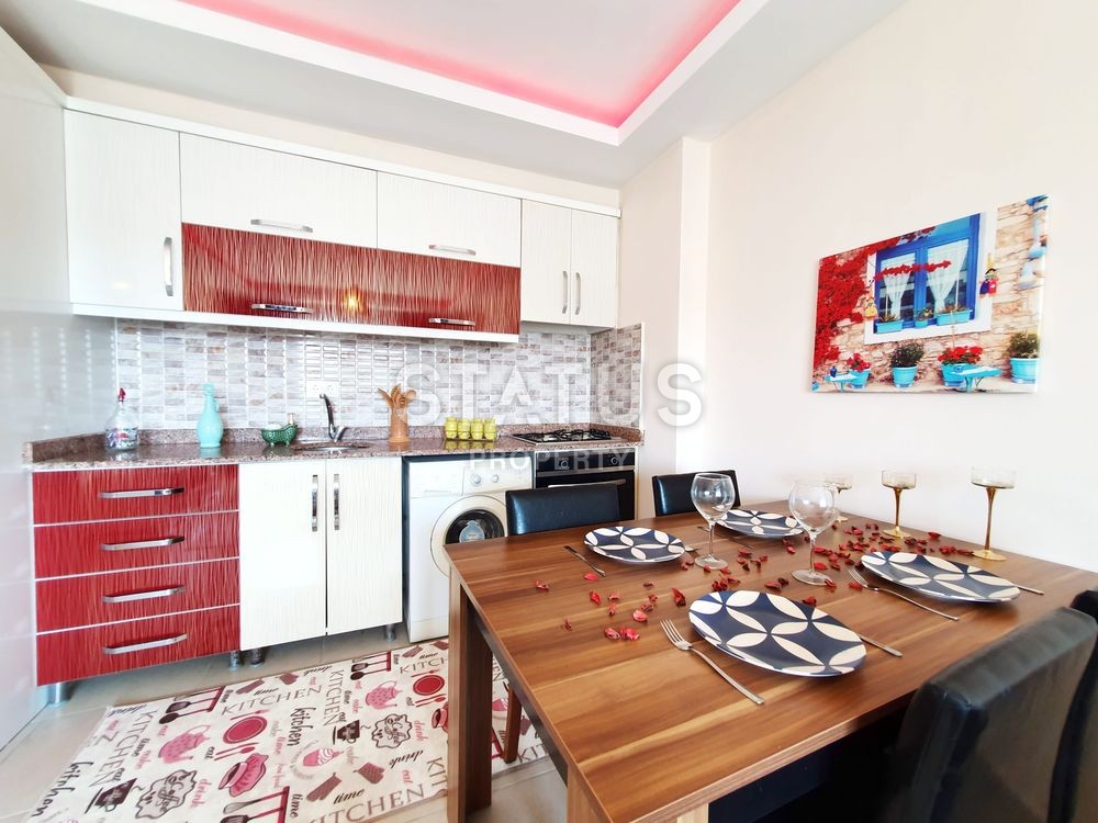 Меблированная двухкомнатная квартира в Махмутларе, 72 м2 фото 9