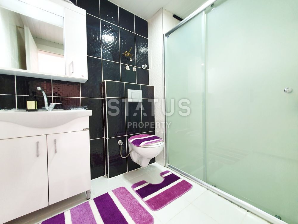 Меблированная двухкомнатная квартира в Махмутларе, 72 м2 фото 12