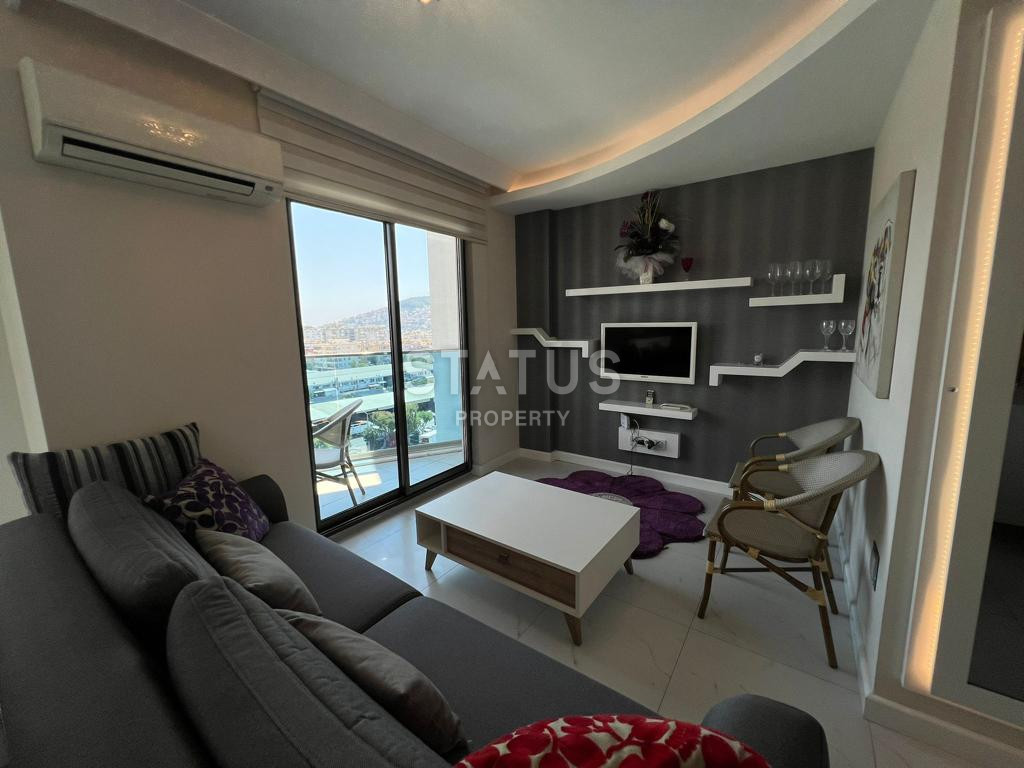 Three-room apartment in the center of Alanya in a residential complex with full infrastructure. Profitable investment! 88 m2 фото 3