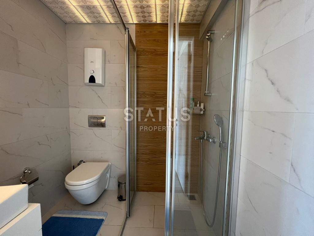 Three-room apartment in the center of Alanya in a residential complex with full infrastructure. Profitable investment! 88 m2 фото 15