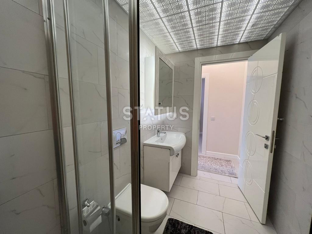 Three-room apartment in the center of Alanya in a residential complex with full infrastructure. Profitable investment! 88 m2 фото 24