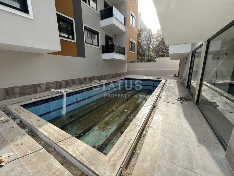 Двухкомнатная квартира в новом ЖК в центре Аланьи. 55м2 фото 9