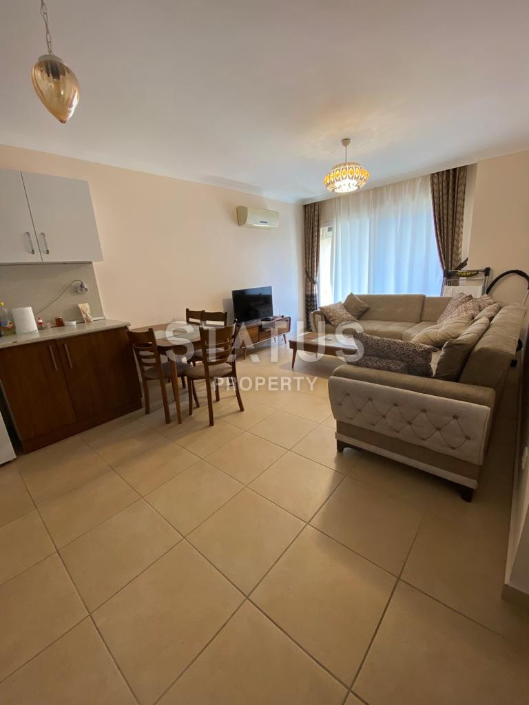 Spacious furnished 1+1 apartment in a complex with infrastructure in Mahmutlar. 65m2 фото 4
