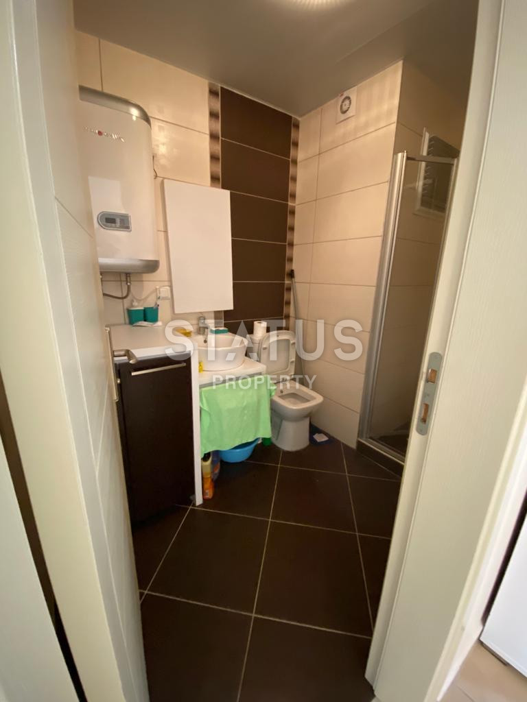 Spacious furnished 1+1 apartment in a complex with infrastructure in Mahmutlar. 65m2 фото 6