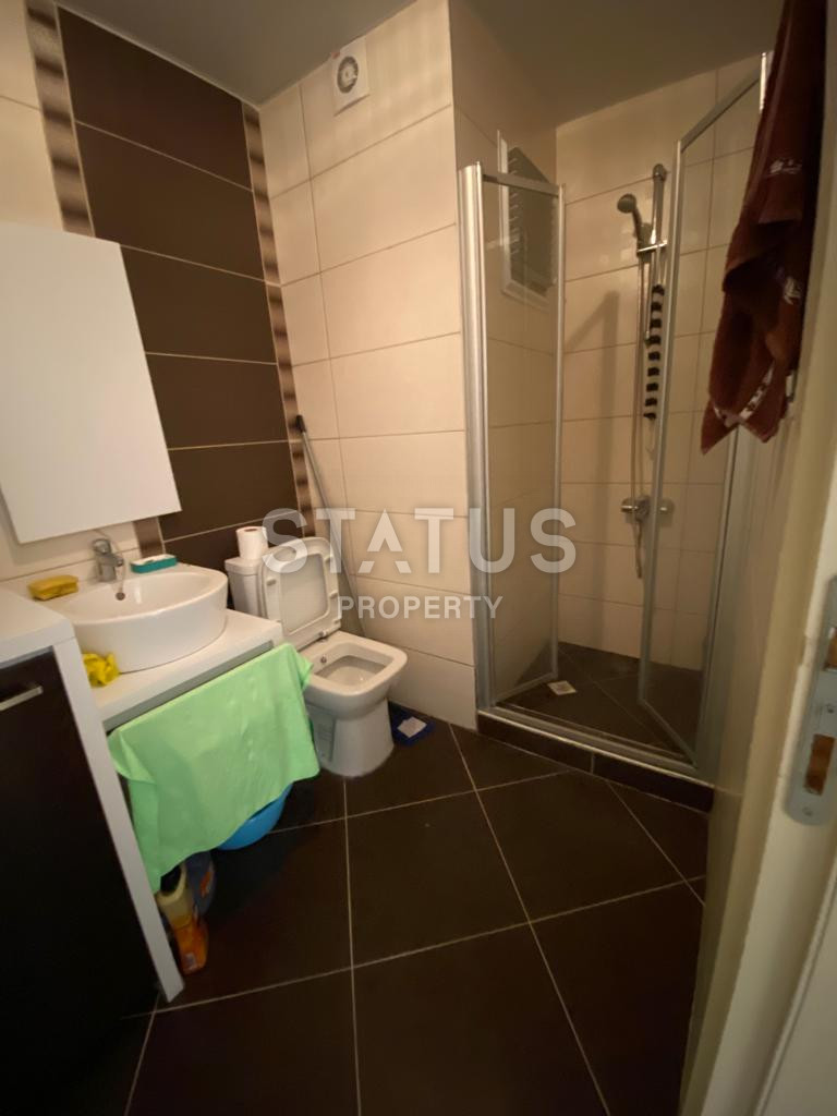 Spacious furnished 1+1 apartment in a complex with infrastructure in Mahmutlar. 65m2 фото 7