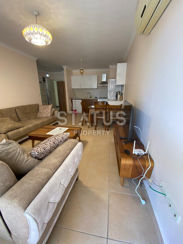 Spacious furnished 1+1 apartment in a complex with infrastructure in Mahmutlar. 65m2 фото 12