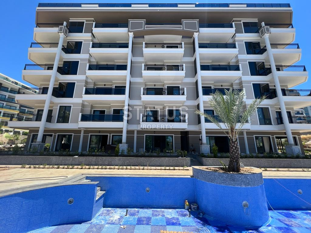 2 apartments: duplex with a garden and 1+1 in a new premium class residential complex in Kargicak. фото 8