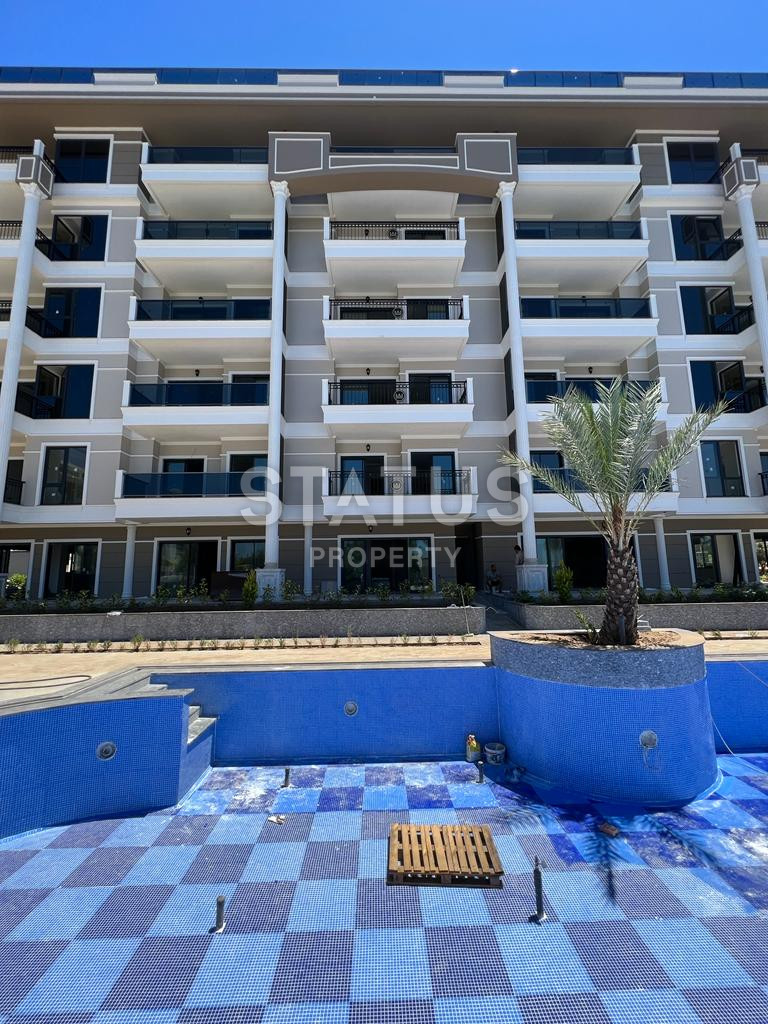 2 apartments: duplex with a garden and 1+1 in a new premium class residential complex in Kargicak. фото 11