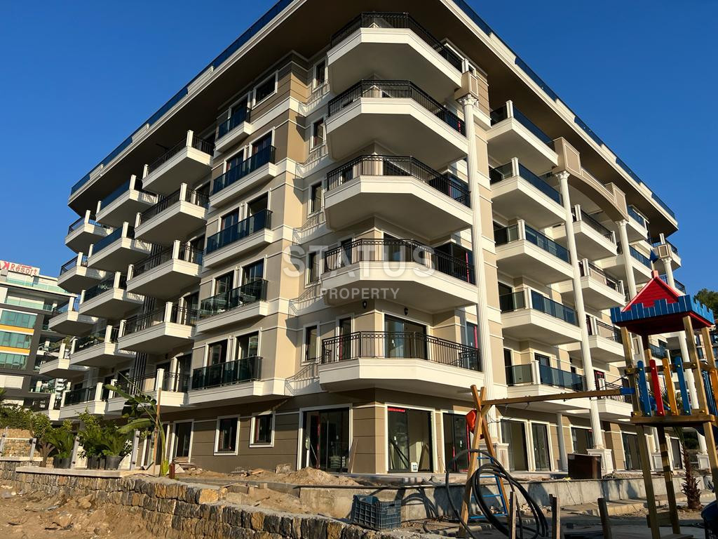 2 apartments: duplex with a garden and 1+1 in a new premium class residential complex in Kargicak. фото 12